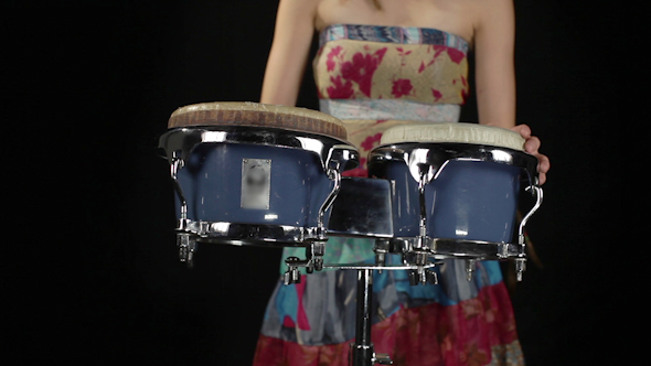 Female Percussion Drummer Performing With Bongos