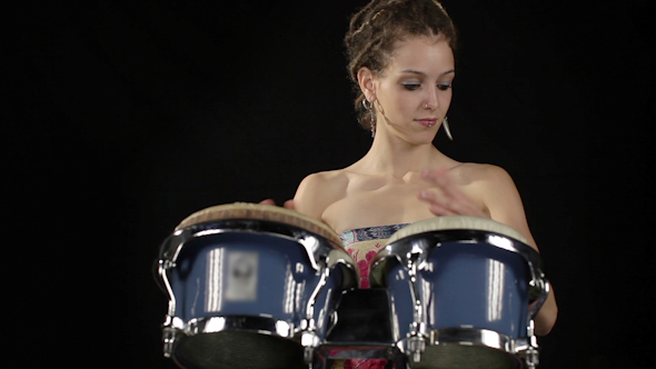 Female Percussion Drummer Performing With Bongos