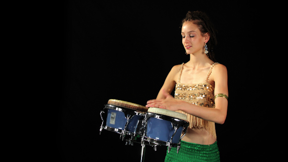 Beautiful Female Percussion Drummer Performing With Bongos