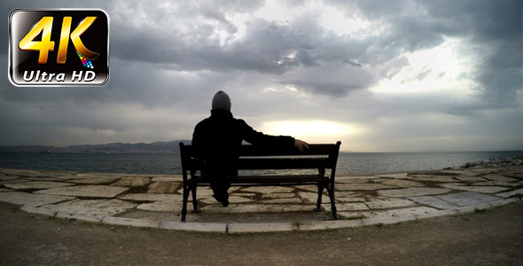 Man on a Seat Near the Sea 2