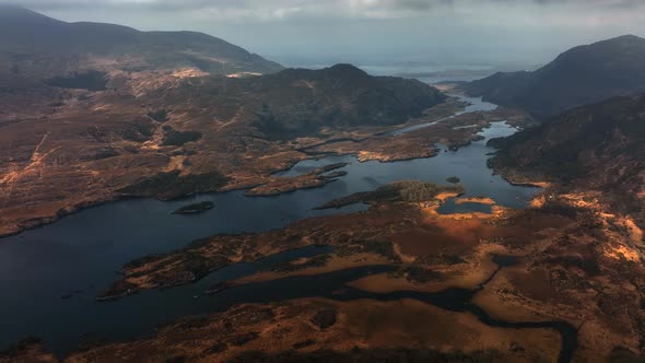 Upper Lake, Killarney, Kerry, Ireland, March 2022. Drone pulls over the rugged landscape facing nort