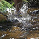 Slow Motion Runners Foot Splash in a Creek - VideoHive Item for Sale