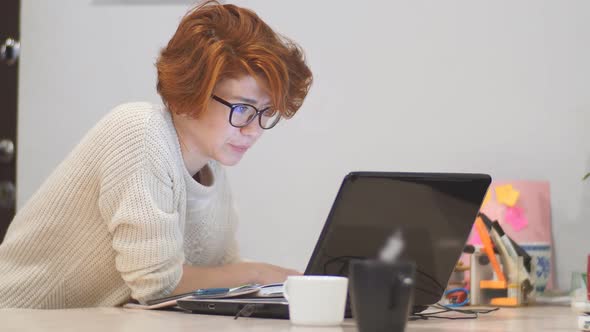 Tired Woman Working Late, Using Laptop. Technology and Overworking Concept