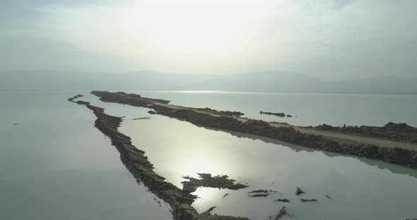 Aerial view of sunrise over salt veins in the Dead Sea, Negev, Israel.