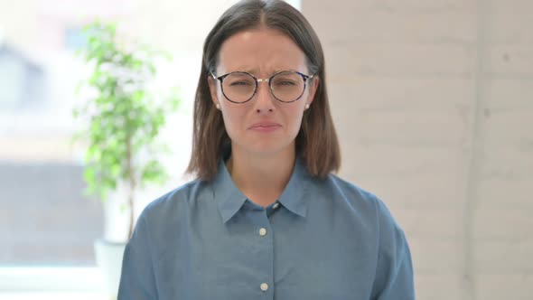 Portrait of Young Woman Crying, Feeling Sad