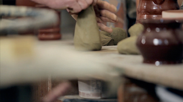 Hand Of An Artisan Master Preparing Clay