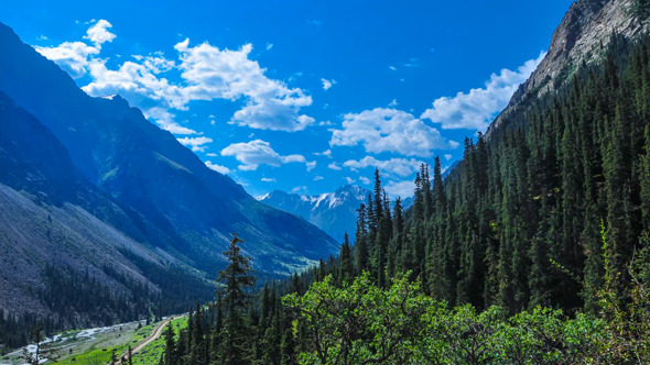 Mountains, trees, clouds