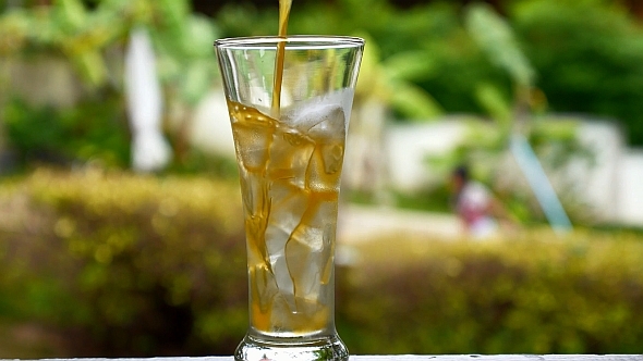 Pouring Juice in Glass alt