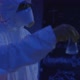 Chemistry man with the masks is working with the liquids - VideoHive Item for Sale
