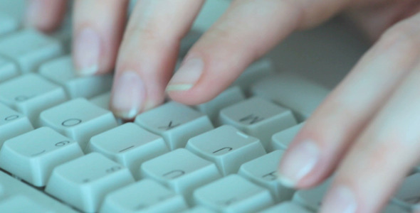 Female Hands Typing