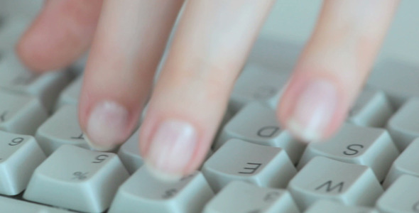 Fingers Touching Computer Keys