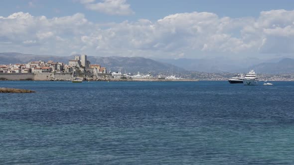 ANTIBES, FRANCE - JULY 2017   Tilting over famous  fortified city  on French riviera slow motion foo