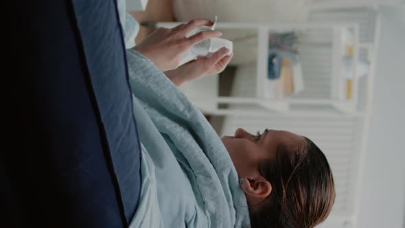 Vertical Video Ill Woman Reading Package Leaflet for Information About Medication