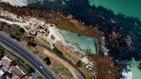 Aerial view of Glencairn tidal pool summer swim, Cape Town, South Africa.