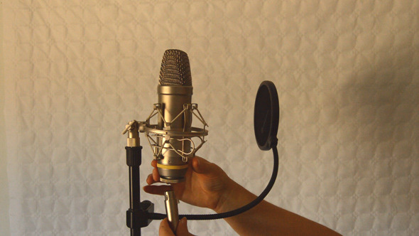 Woman Connects Studio Microphone