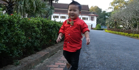 Kid Walking On The Road