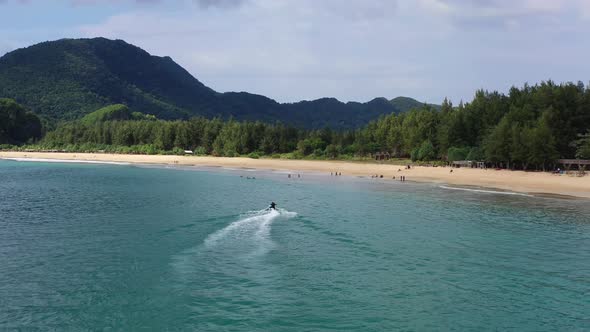 AH - Jetski in Tropical Ocean and Beautiful Island 01