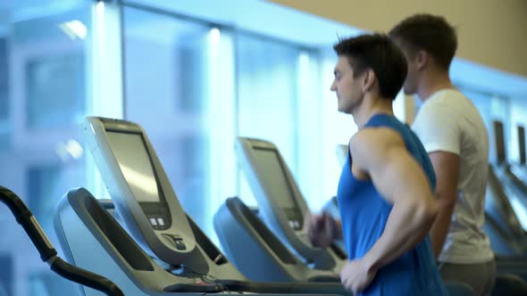 Running men on a treadmill