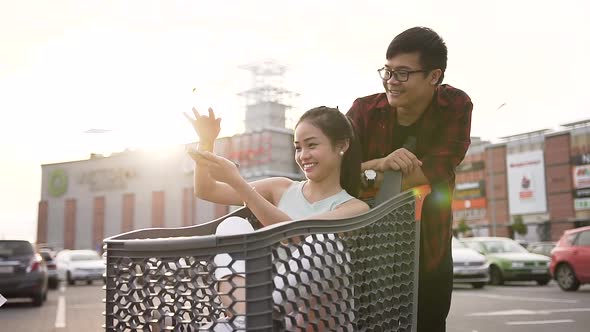 Adorable Asian Pair of Young People Spending their Time with Joy 