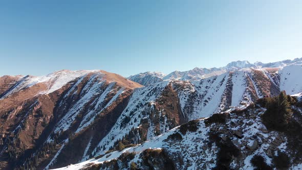 Aerial Shot of Small Hikers in the Beautiful Mountains