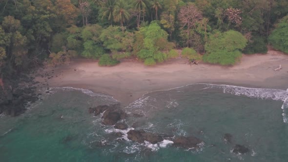 Espadilla South white sandy tropical Beach, Manuel Antonio National Park, Costa Rica. Aerial drone v