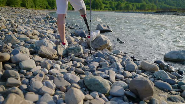 Handicapped Person is Travelling in Nature Closeup of Modern Prosthetic Leg