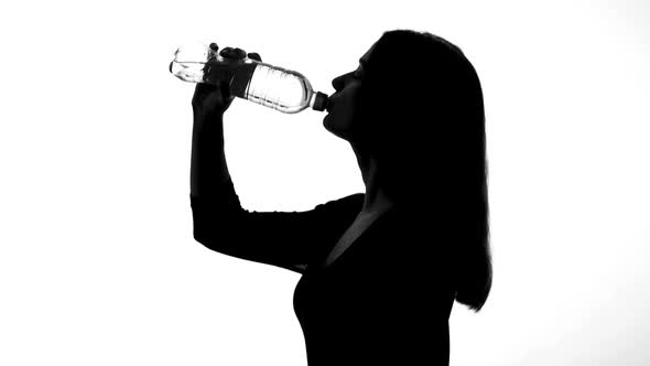 Woman Drinking Water From Bottle, Healthy Way of Life, Restoring Ph Balance