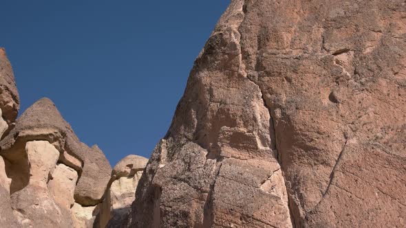 Huge Stone Formation on Clear Sky Background