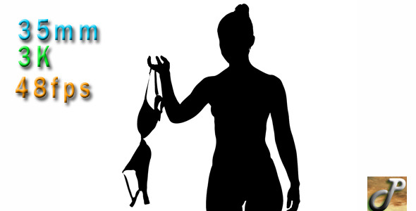 Silhouette Of Young Woman Undressing