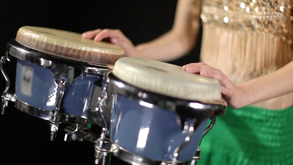 Female Percussion Drummer Performing With Bongos 3