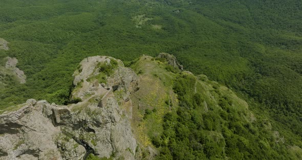 Foggy, dreamy panorama of the Azeula Fortress, wild forest and the Kojori town.