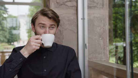 Happy Man Drinking Coffee and Enjoy His Life