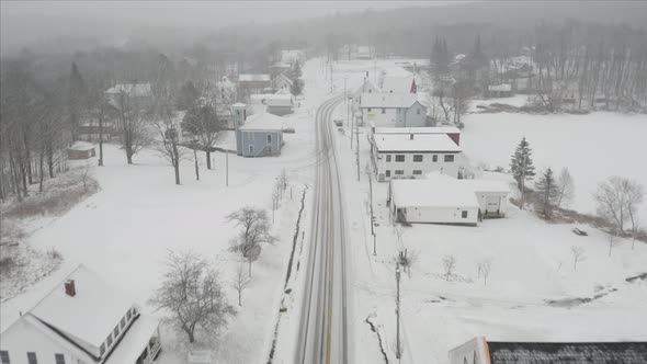 Small town surrounded by wilderness snowfall