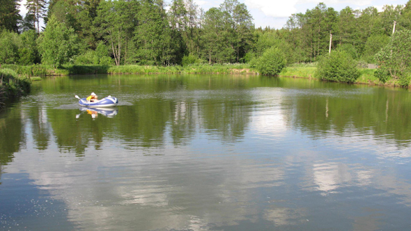 Children In Boat On Pond 