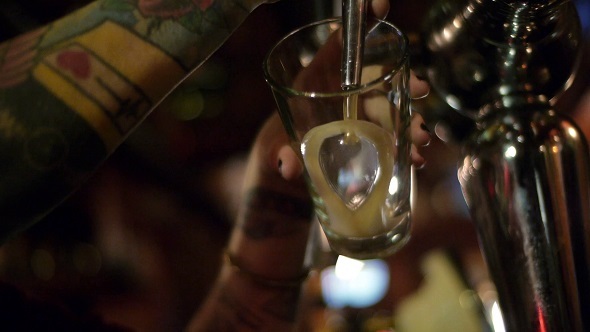 Draught Beer Being Poured To A Glass