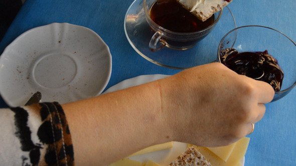 Woman Eating Breakfast