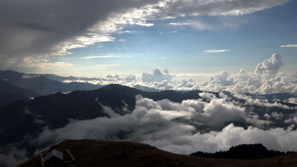 Mountain House and Spectacular Landscape Above the Clouds