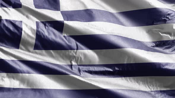 Greece textile flag waving on the wind. Slow motion. 20 seconds loop.