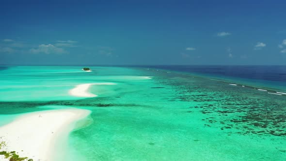 Aerial drone view scenery of exotic lagoon beach voyage by blue water with white sand background of 