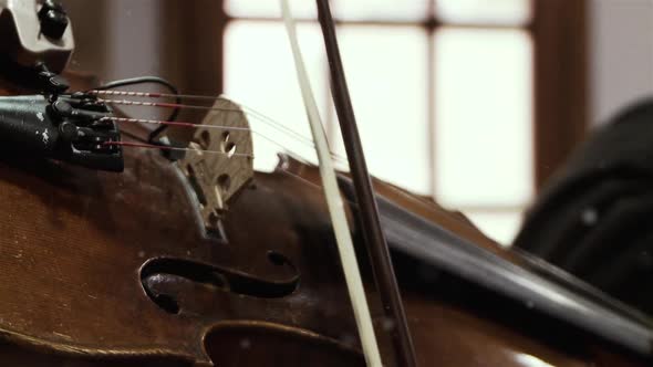 Woman Fiddle Player taking part in a Trio Band. Close-Up.