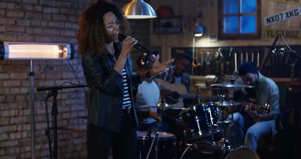 Young Musicians Playing in Garage