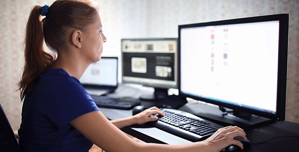 Woman Working at a Compute