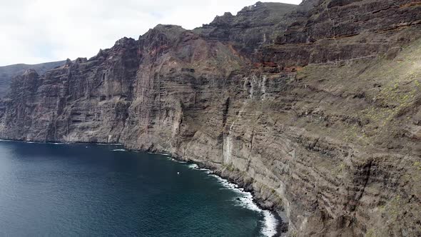 Aerial drone view of Los Gigantes cliffs in Tenerife, Gran Canaria, Spain.