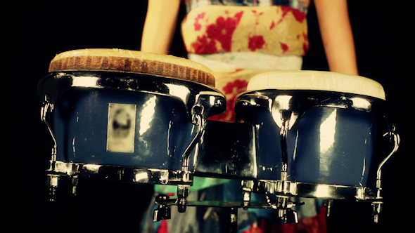 Female Percussion Drummer Performing With Bongos 5