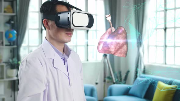 Male Doctor Using Vr Glasses Virtual Reality Touching 3D Human Lung Holographic
