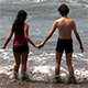 Couple Hesitating to Enter the Sea - VideoHive Item for Sale