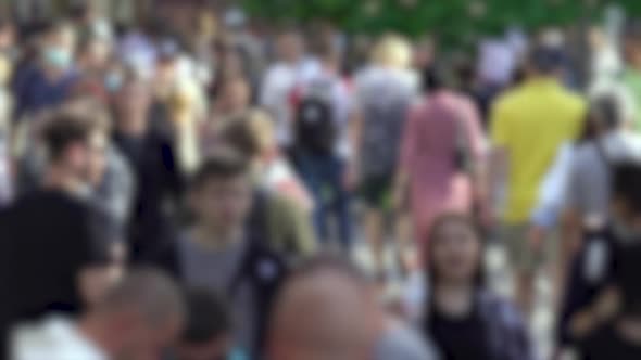 Silhouettes of People Walking in a Crowd Slow Motion