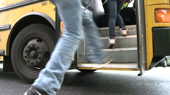 Children Get On Bus (1 Of 3)