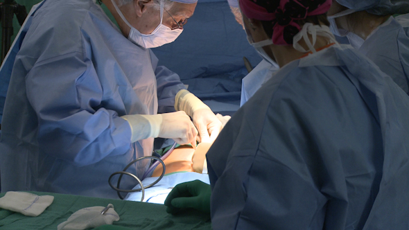 Group Of Surgeons Performing Surgery (15 Of 15)