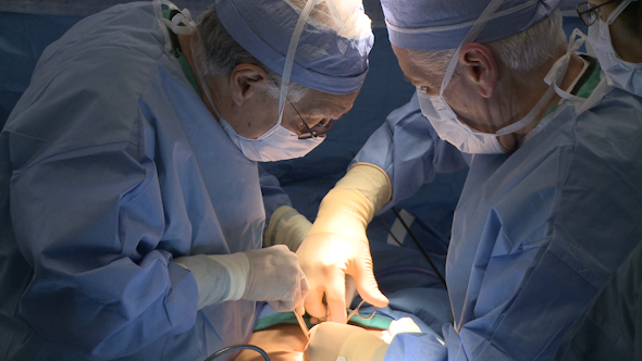 Group Of Surgeons Performing Surgery (2 Of 15)